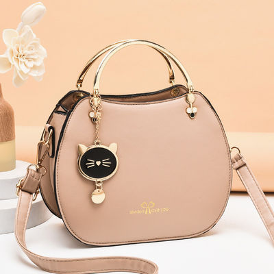 Trendy Single Shoulder Women's Handbag with Cat Pendant and Zipper Closure